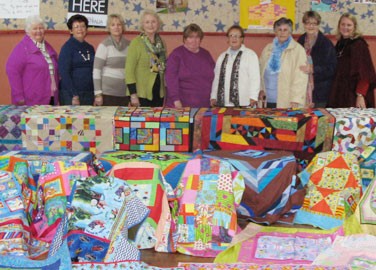 Craft group with quilts